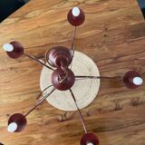 Deep red tassel and wrought iron chandelier
