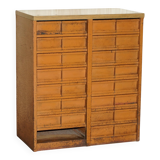 Industrial metal chest of drawers with 30 drawers.