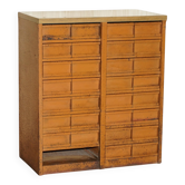Industrial metal chest of drawers with 30 drawers.
