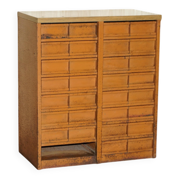 Industrial metal chest of drawers with 30 drawers.