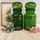 2 jars of green glass apothecary and 1970s gilding