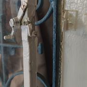 Entrance door in solid oak, cast iron grille, 1930s