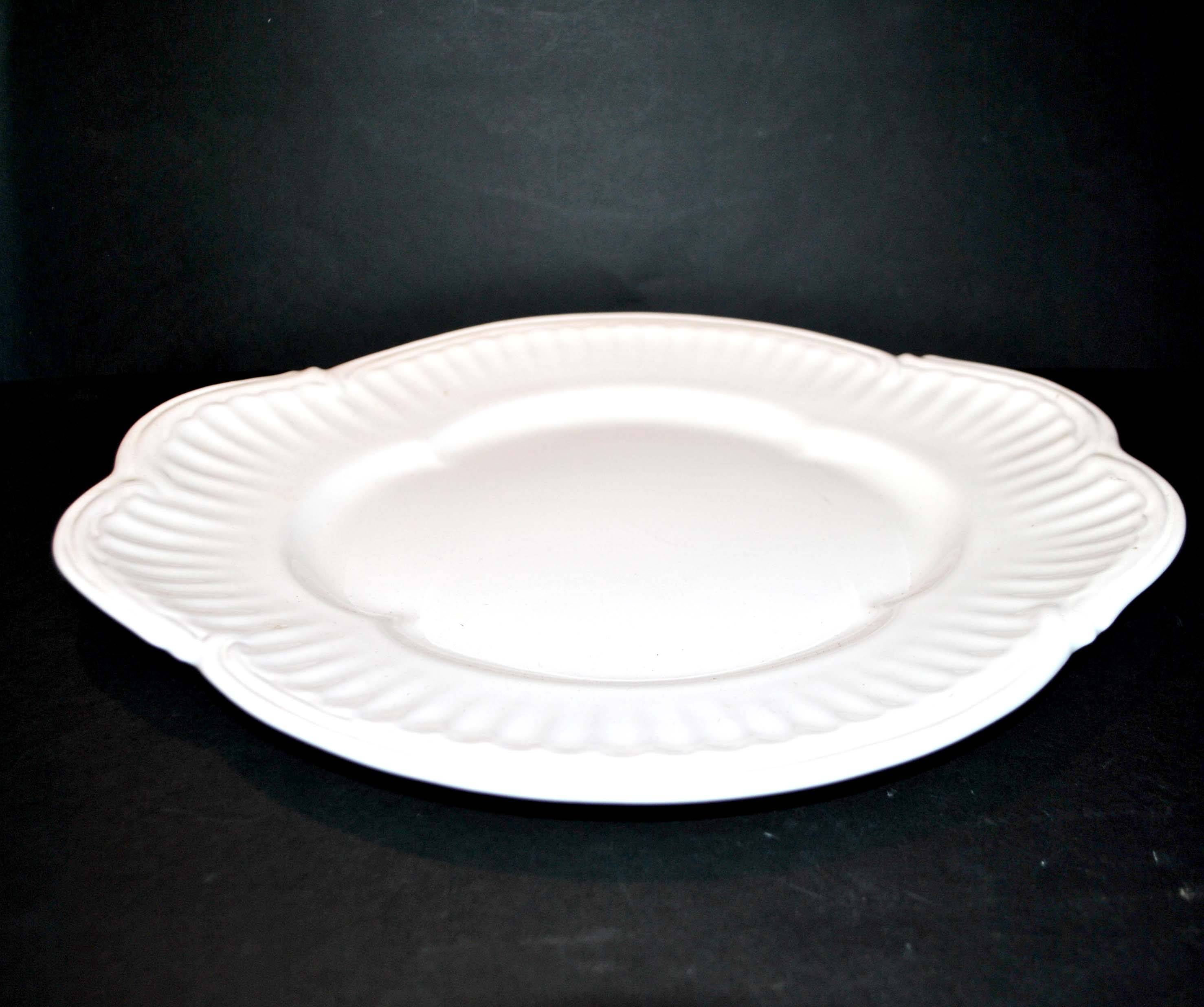 Oval earthenware dish from Niderviller "Beyerlé Grand Siècle" 32x36cm