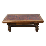 Coffee table with ceramic top and herbarium decor by pierre garnier