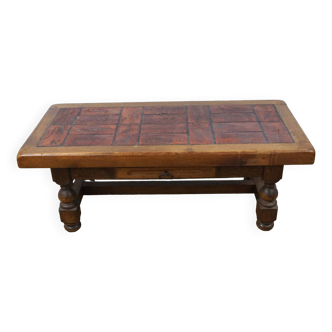 Coffee table with ceramic top and herbarium decor by pierre garnier