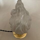 Old laying flame lamp