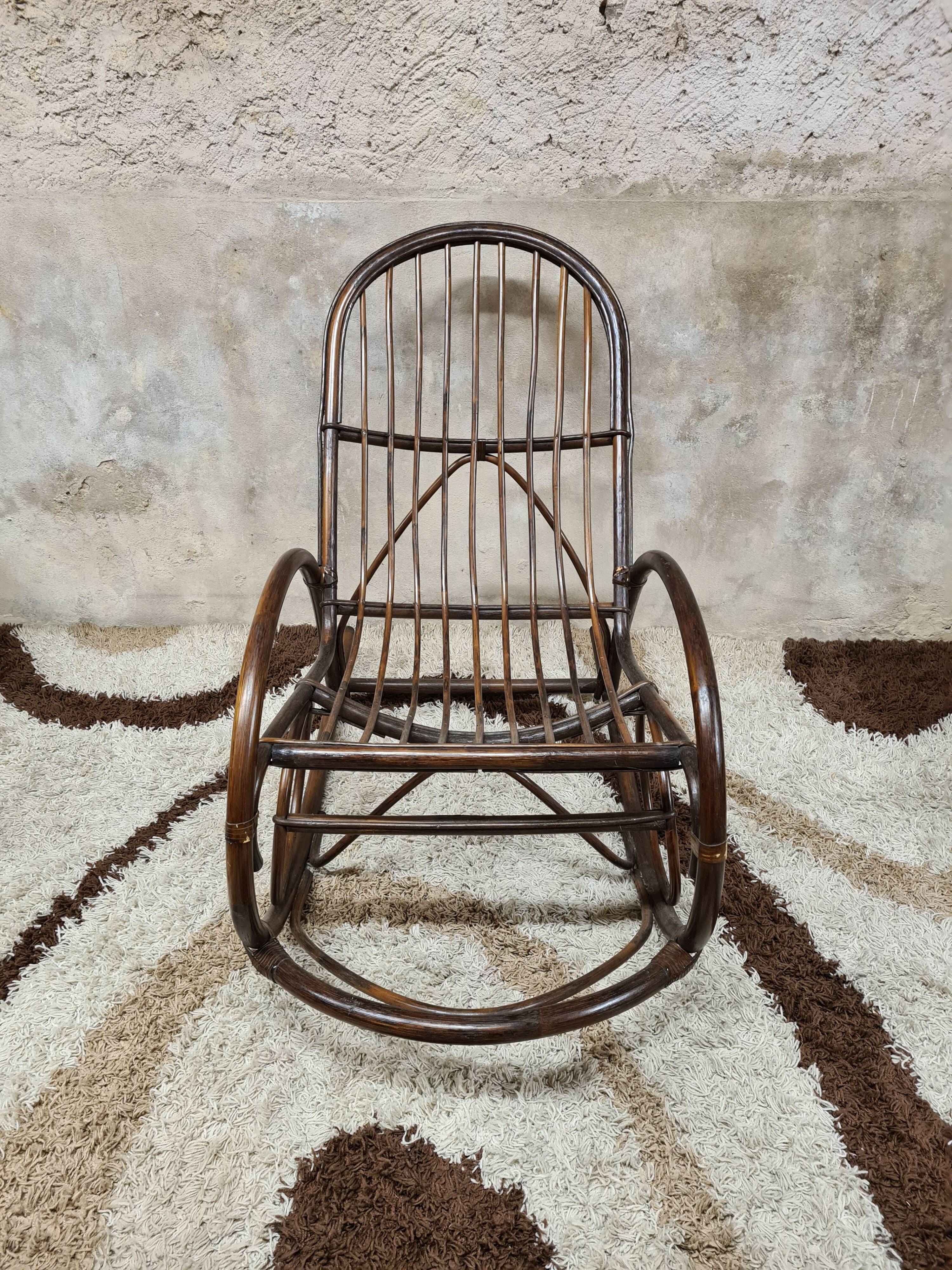 Rocking-chair in rattan bamboo 1970 vintage