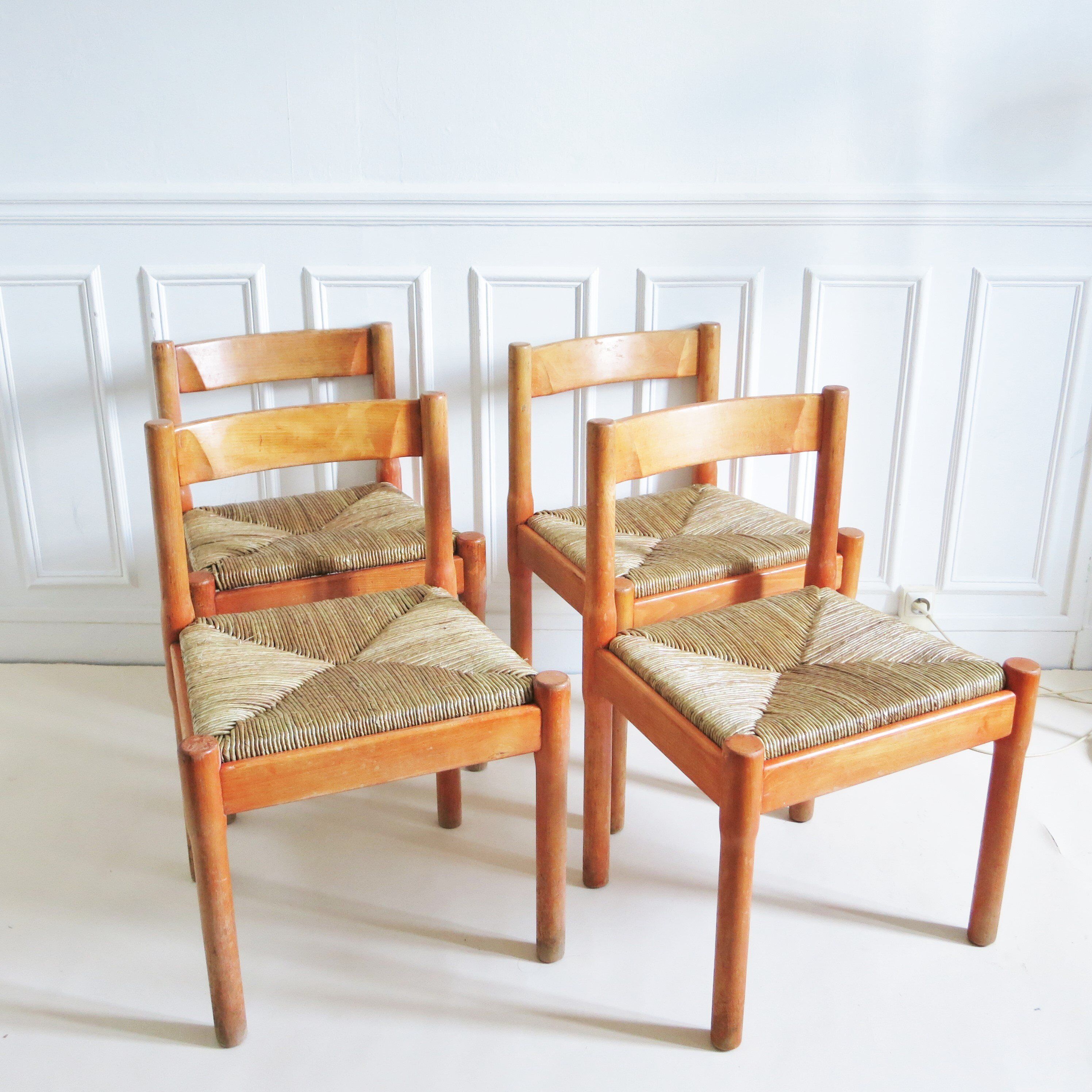 Four chairs Carimate Vico Magistretti Cassina