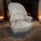 Vintage grey fringed club chair
