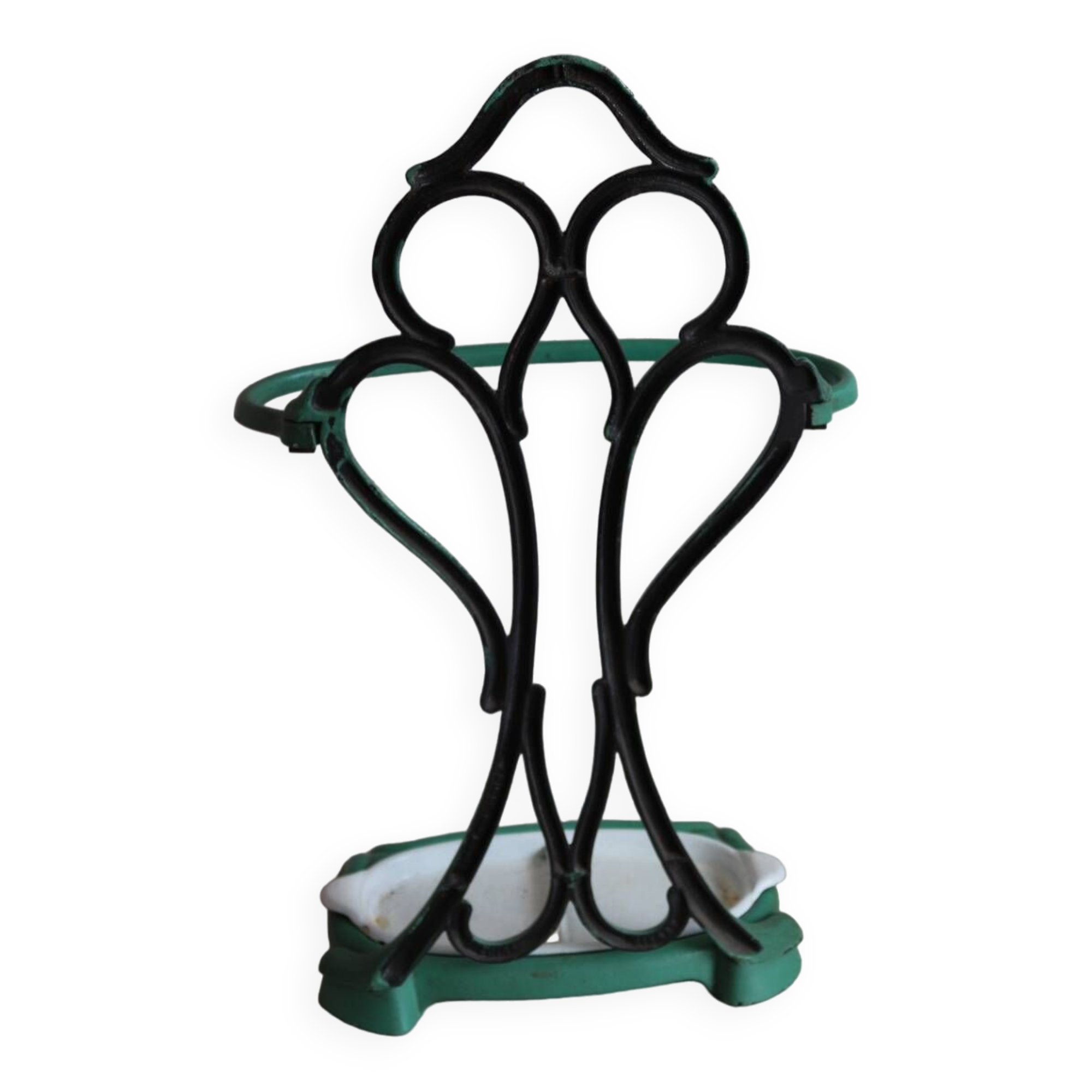 Old green cast iron umbrella stand