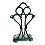 Old green cast iron umbrella stand