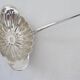 Silver metal sauce ladle