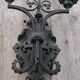 Pair of black wrought iron wall sconces - neo-Gothic style - from the 1950s