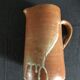 Set of 2 enamelled stoneware jugs