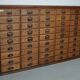 Antique French oak filing / apothecary cabinet by Chouanard, ca 1910