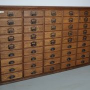 Antique French oak filing / apothecary cabinet by Chouanard, ca 1910