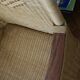 2 rattan and wood armchairs
