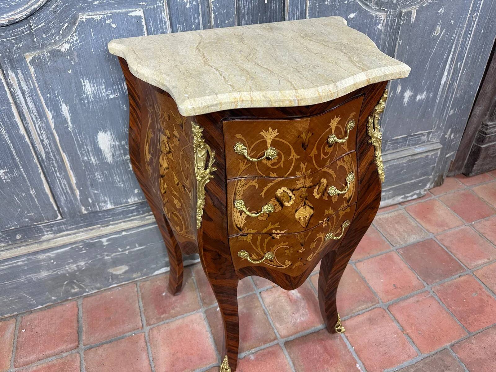 Louis XV commode with marquetry, gilded bronze and marble.