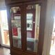 Walnut wardrobe with mirror doors.