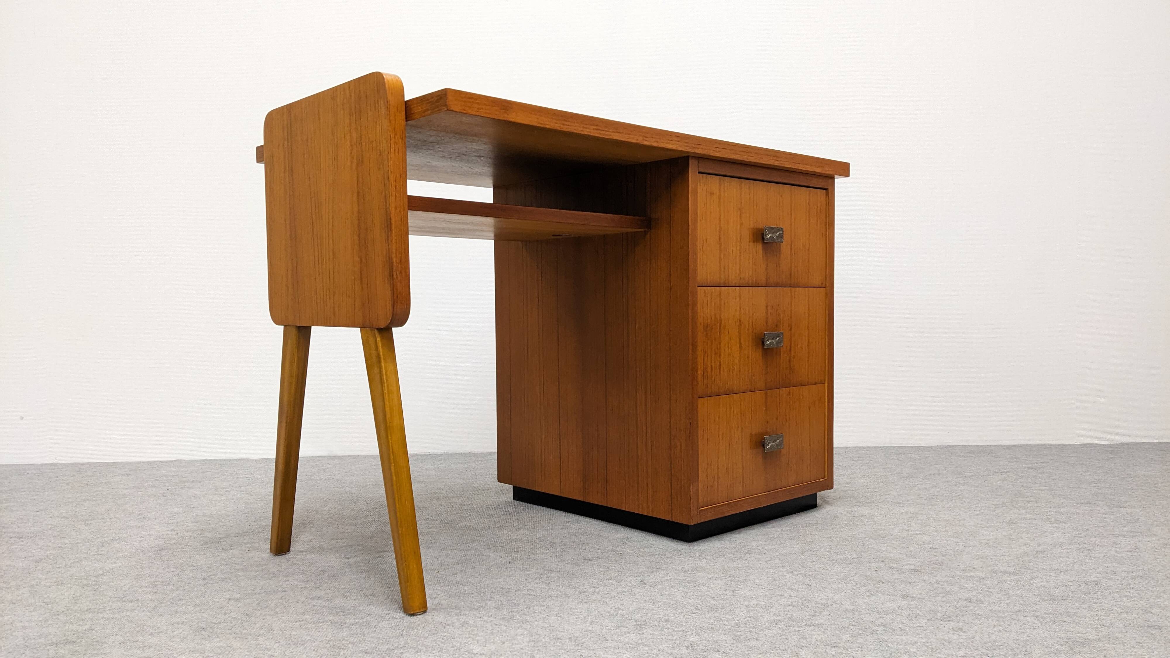 Modernist desk in blonde rosewood, France circa 1960.