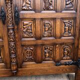 Spanish furniture with carved wood profiles and coats of arms from the 1950s.