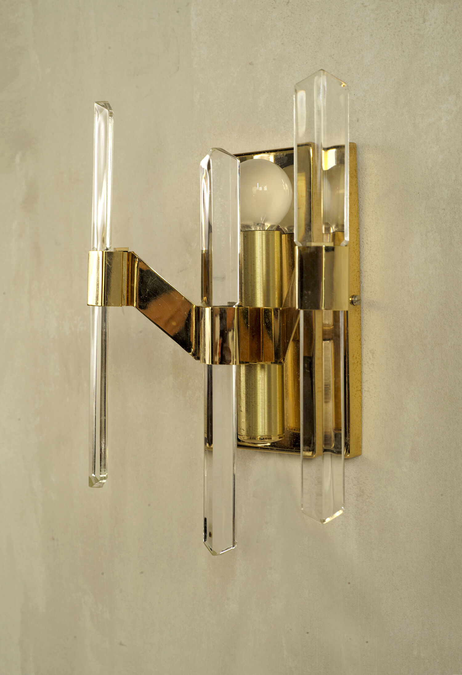 Pair of wall lamps in glass and gilded metal Sciolari