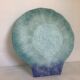 Blue glass paste pocket emptier