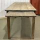19th century farmhouse table in raw chestnut with original drawer and shelf