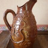 Beauvais sandstone pitcher decorated with a prizery