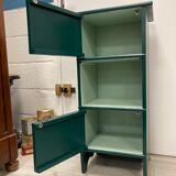 Two-door green bedside table