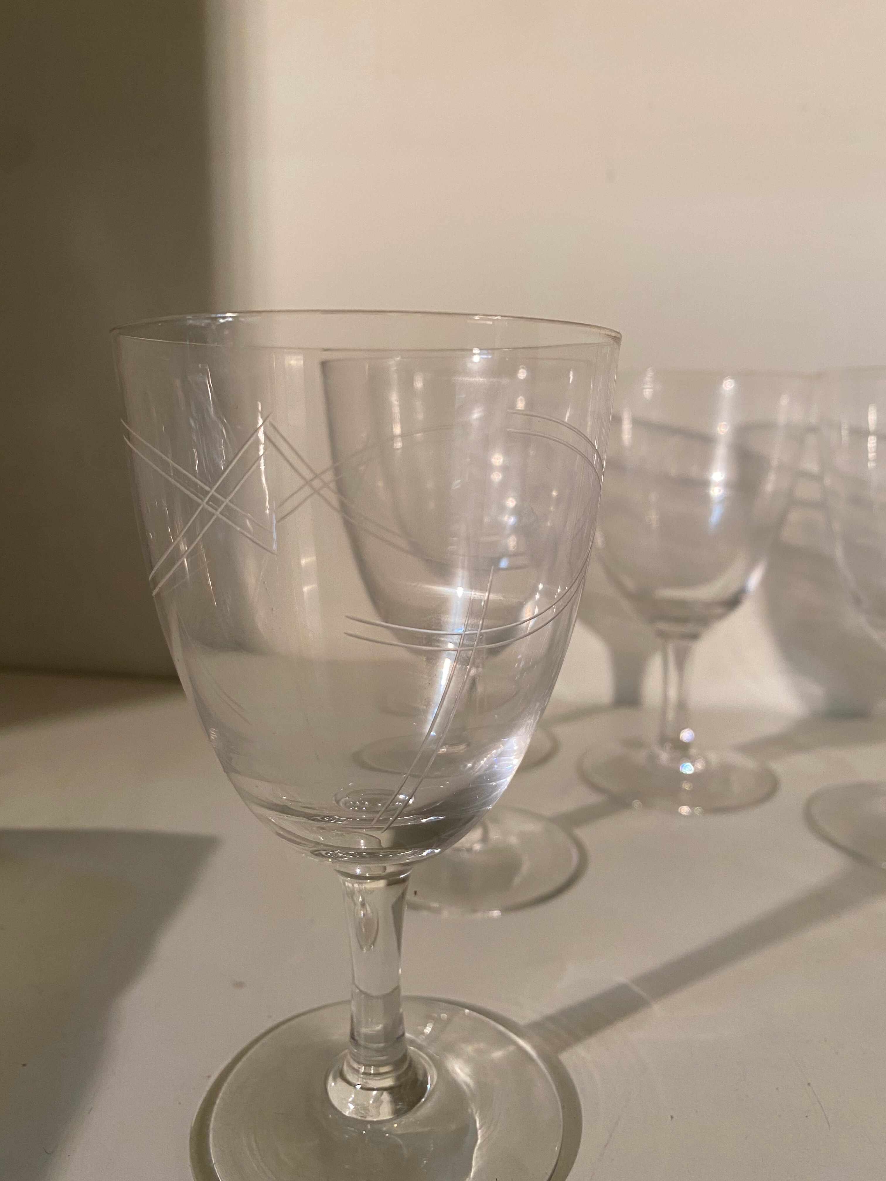 Set of 5 engraved antique wine glasses