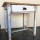 Table vintage wood in raw wood and white industrial chalk