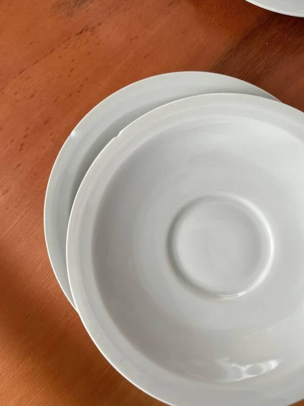 Art Deco cups and saucers by Théodore Haviland in celadon.