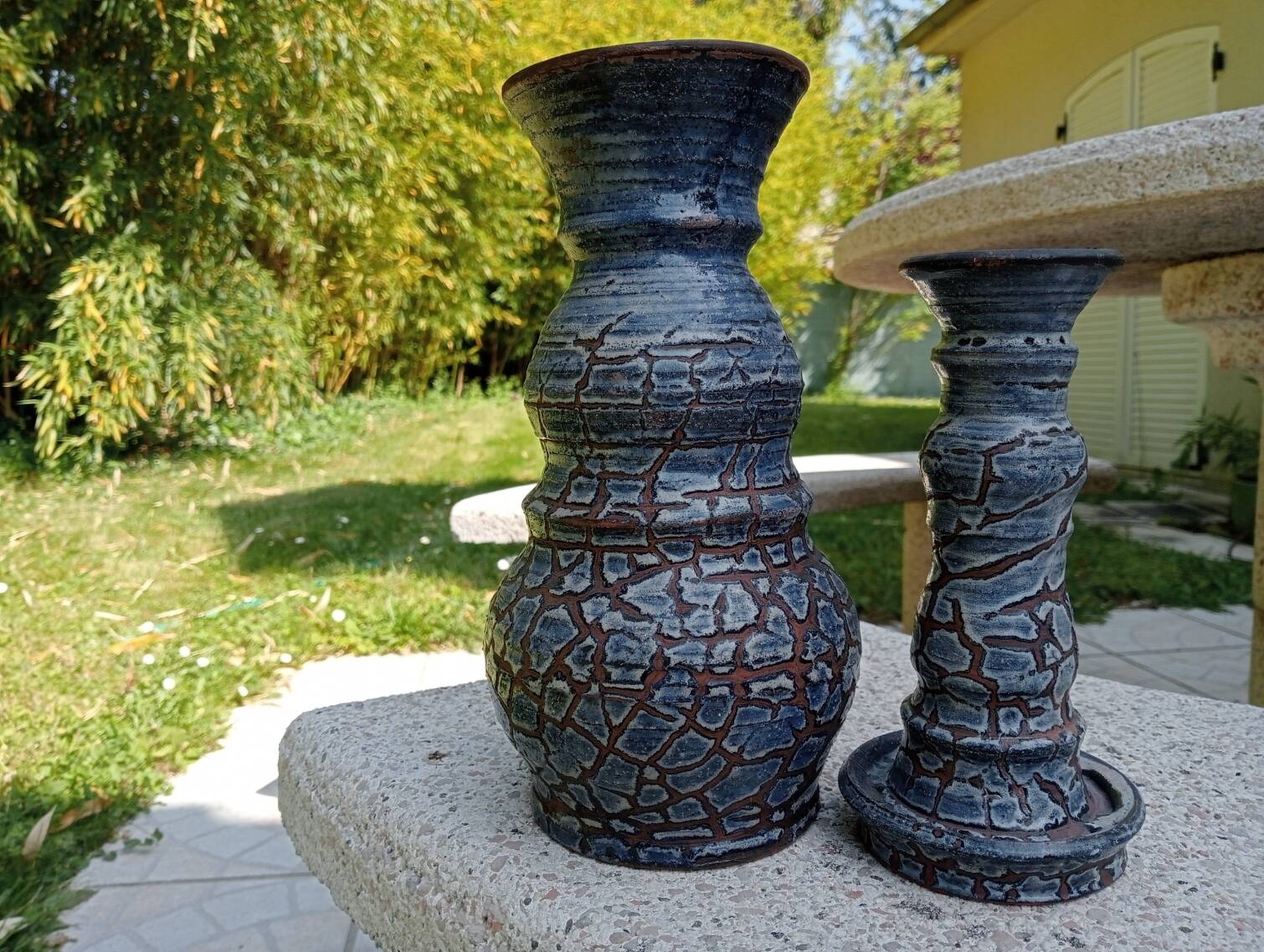 Blue glazed terracotta vase and candle holder
