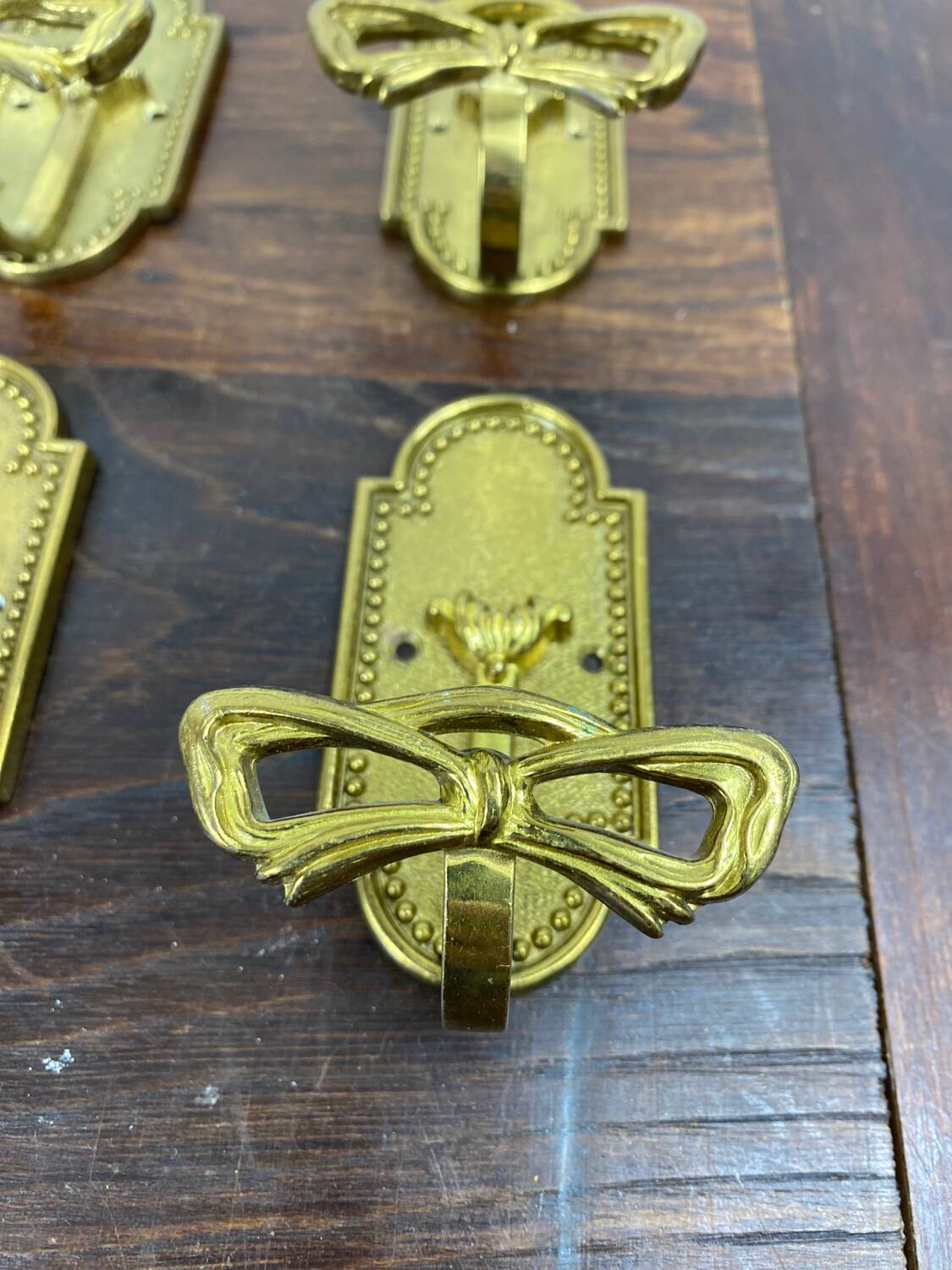 Brass coat hooks