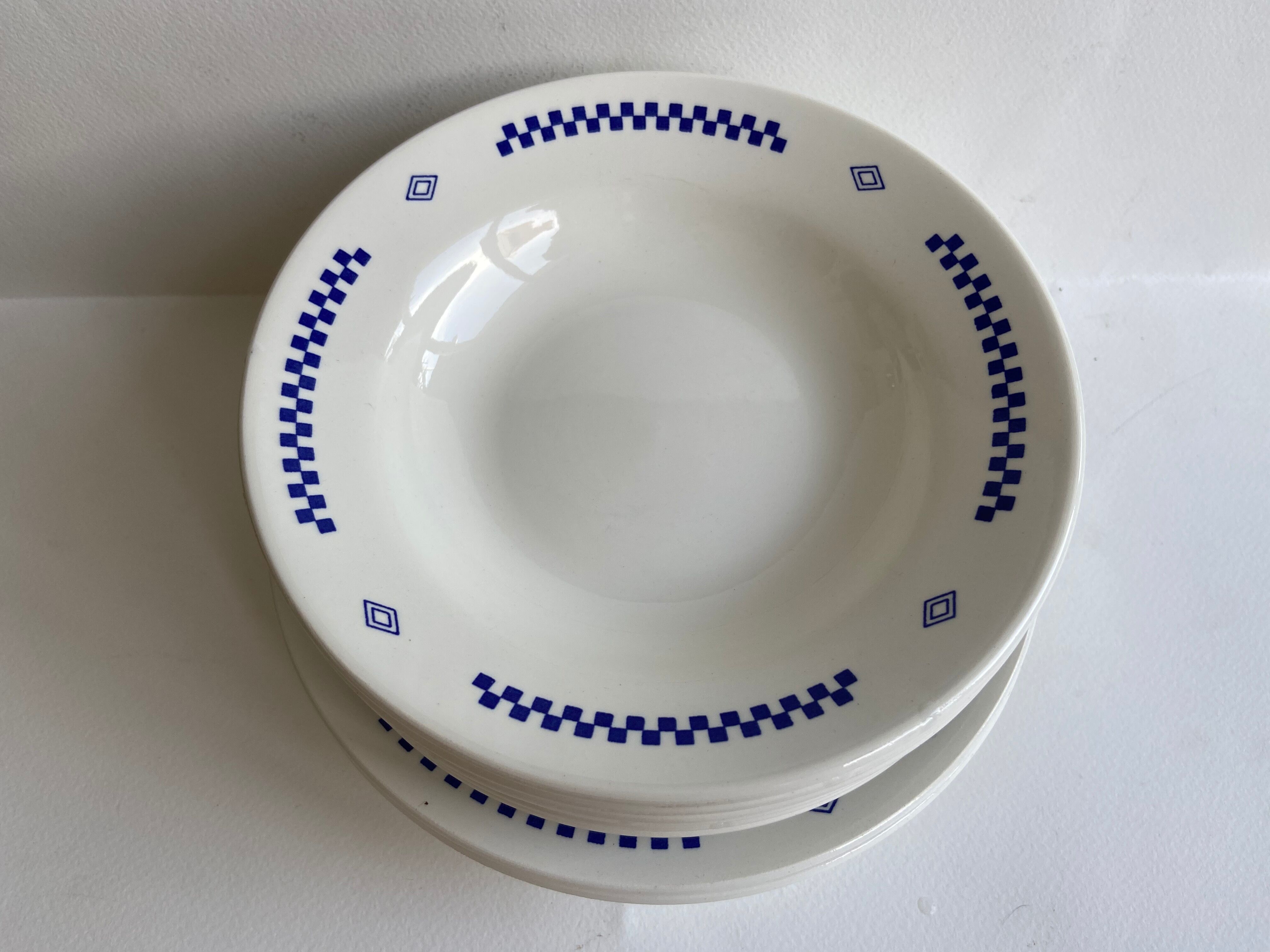 Set of 8 Lustucru hollow plates