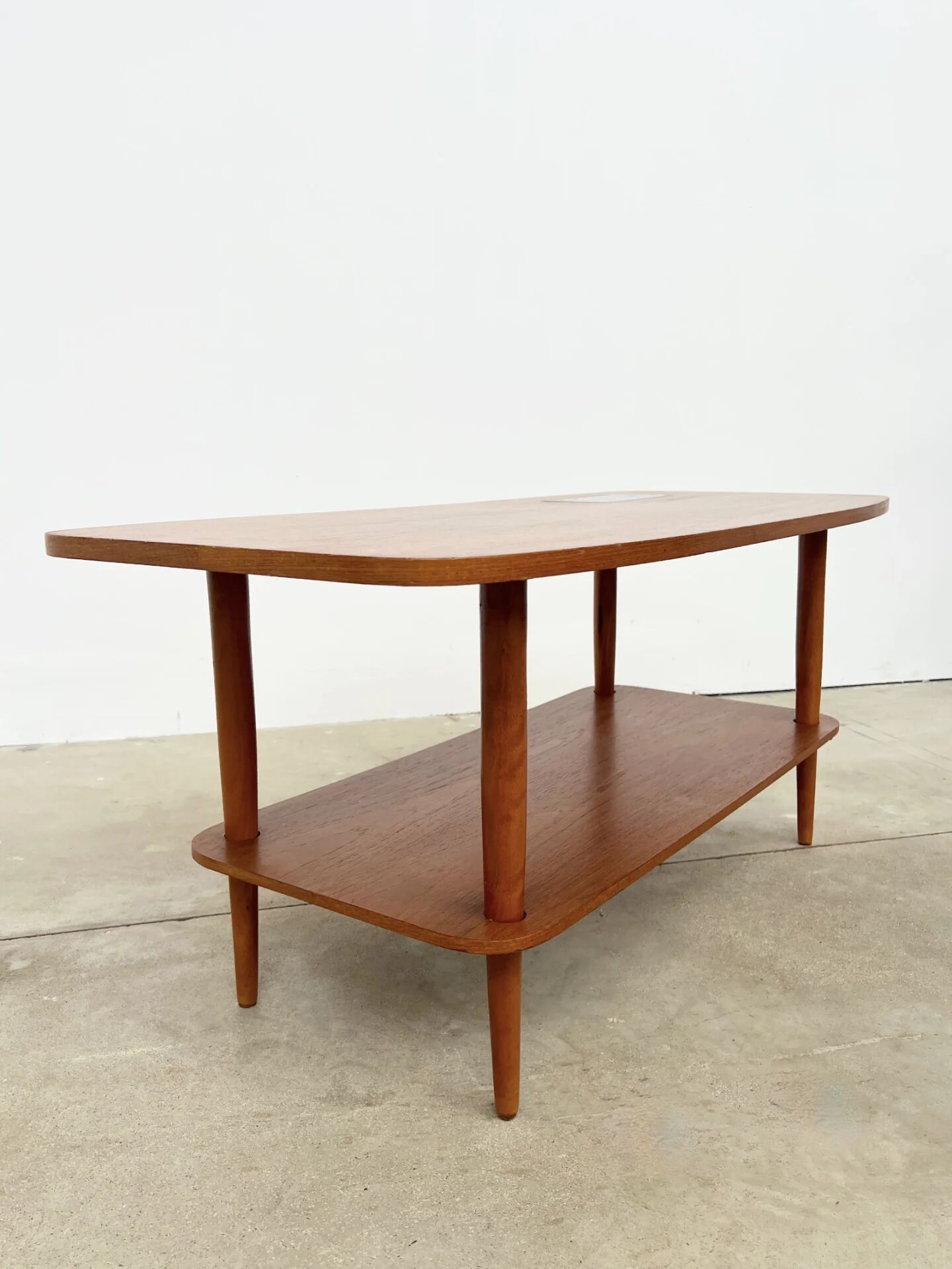 Teak coffee table with double top and ceramic insert — Scandinavian, 1960s
