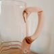 Vintage pink glass water carafe from the 1970s.
