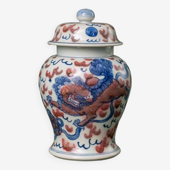 Qing Dynasty lion sporting with embroidered ball Underglaze blue and red covered jar designed