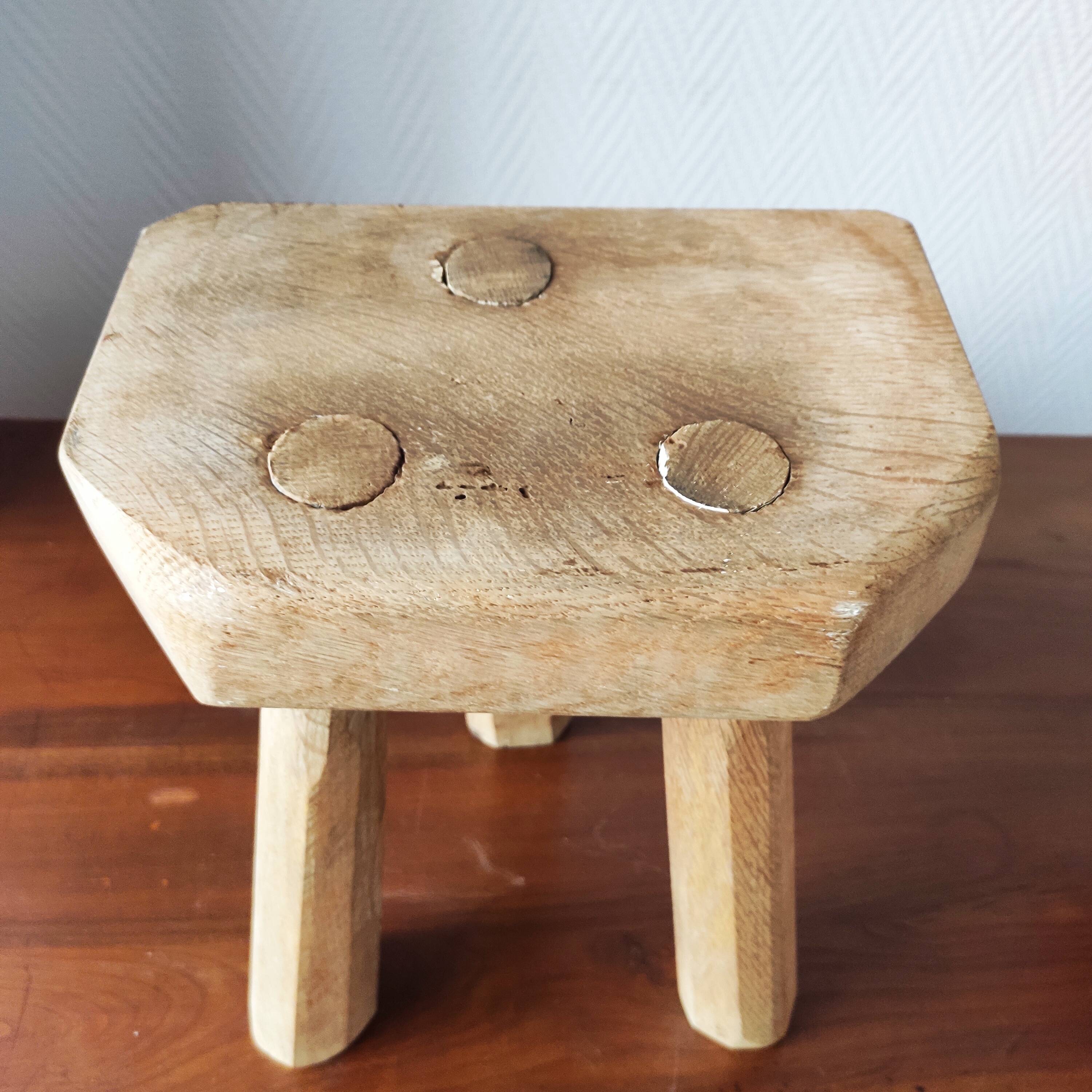 Vintage Danish brutalist tripod stool made of solid oak.