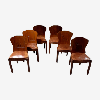 Set of 6 vintage solid wood chairs with animal motif on the back and leather seat