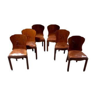 Set of 6 vintage solid wood chairs with animal motif on the back and leather seat