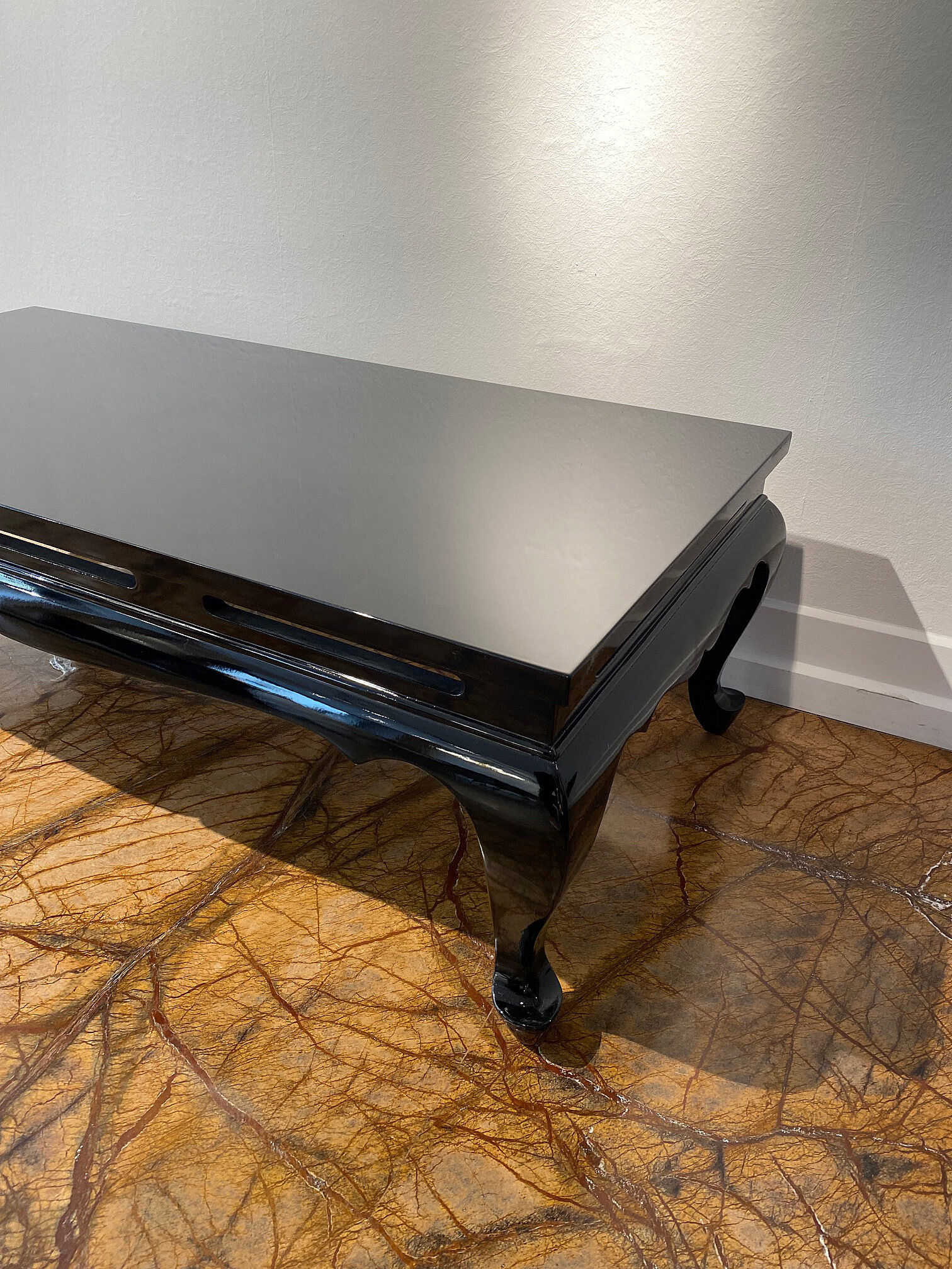 Chinoiserie coffee table with black lacquer