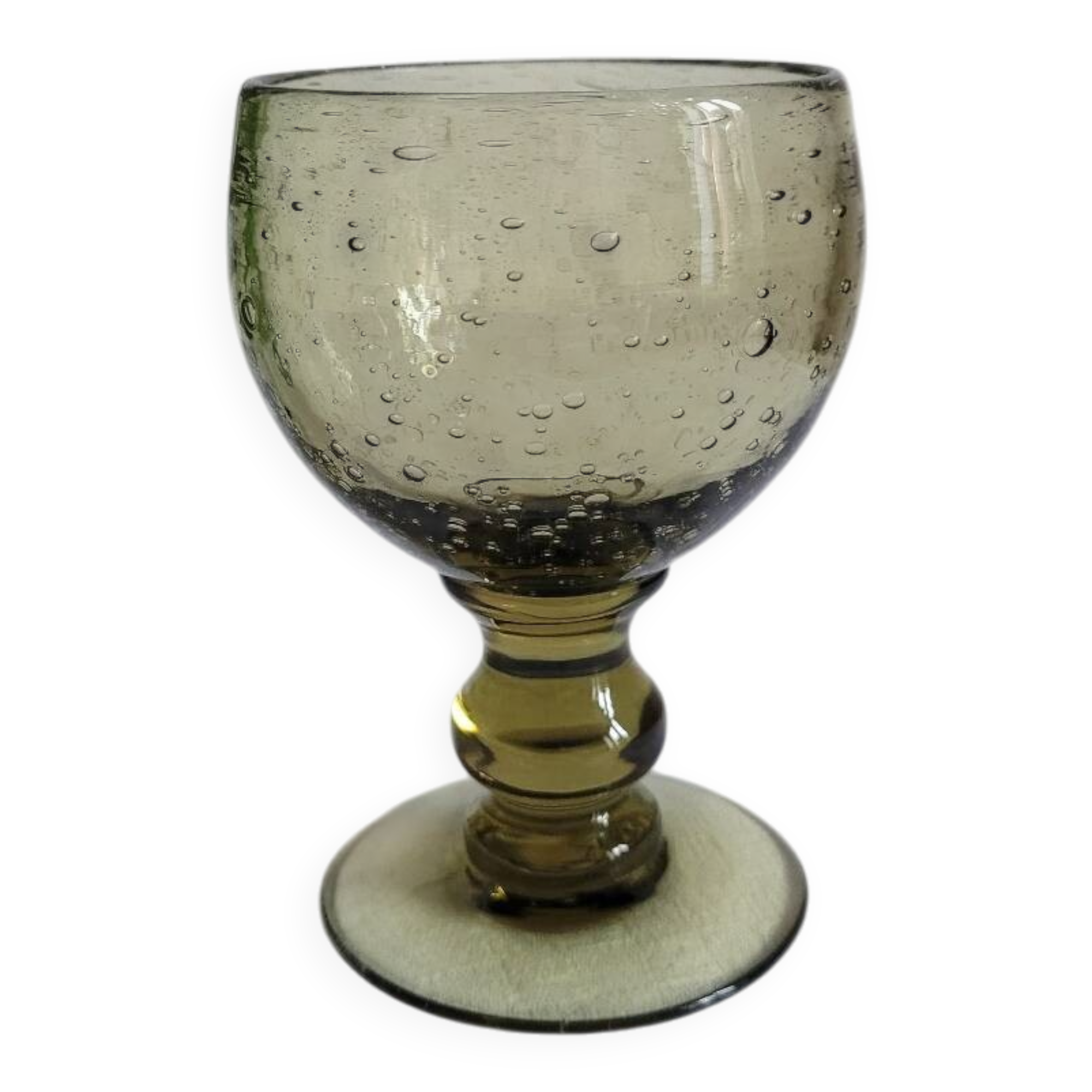 Footed glass made of blown glass