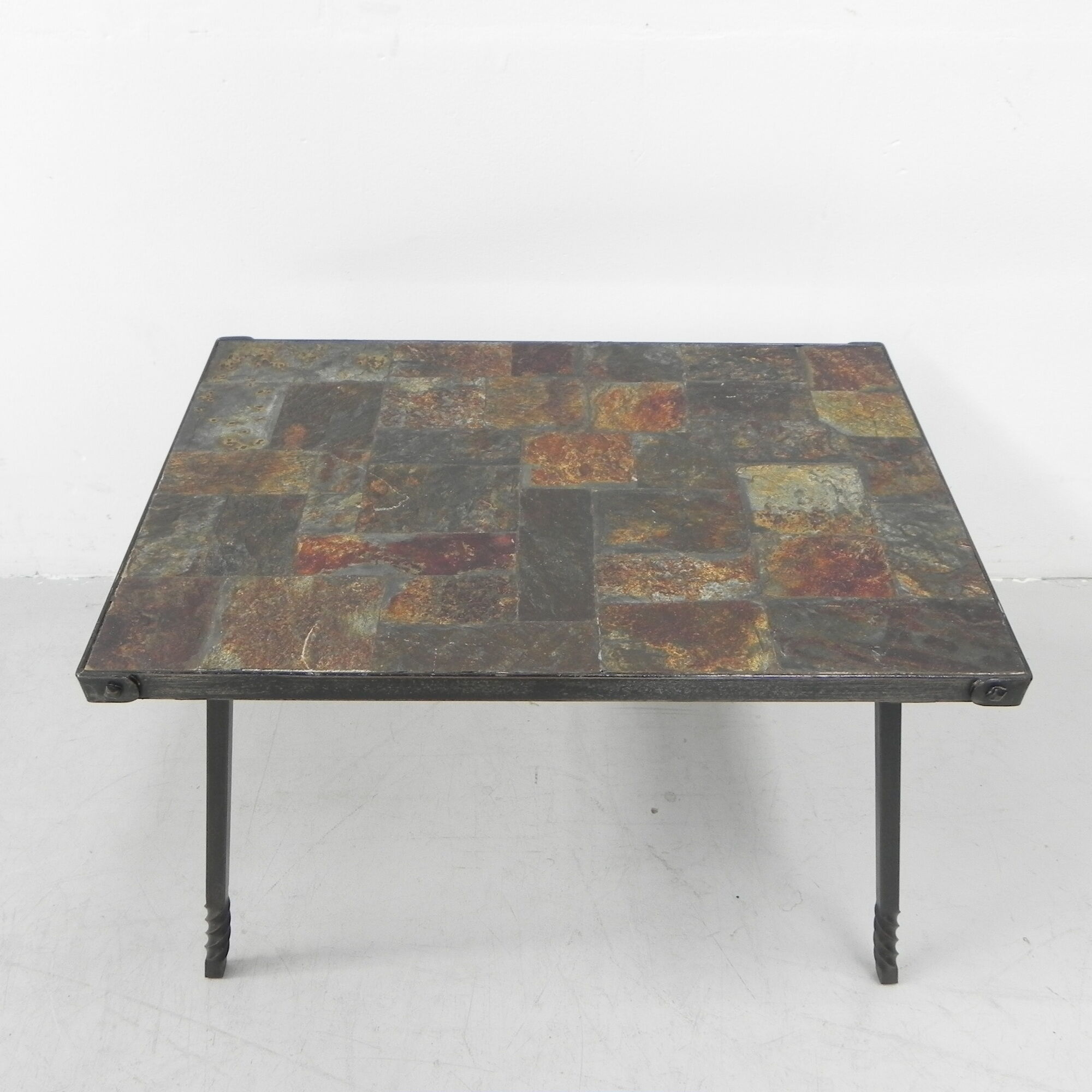 Brutalist coffee table with slate top