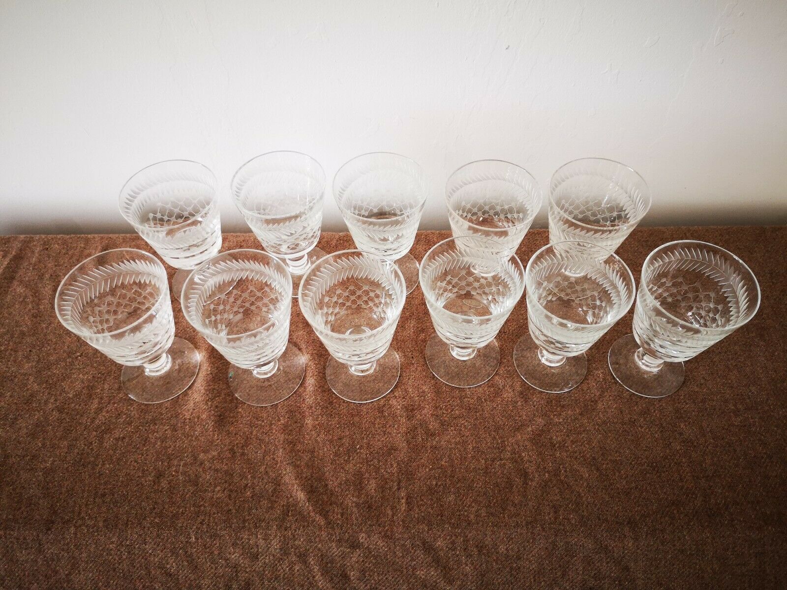 Lot of 11 cut and engraved foot glasses