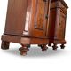 A pair of antique walnut bedside tables from the 1890s.