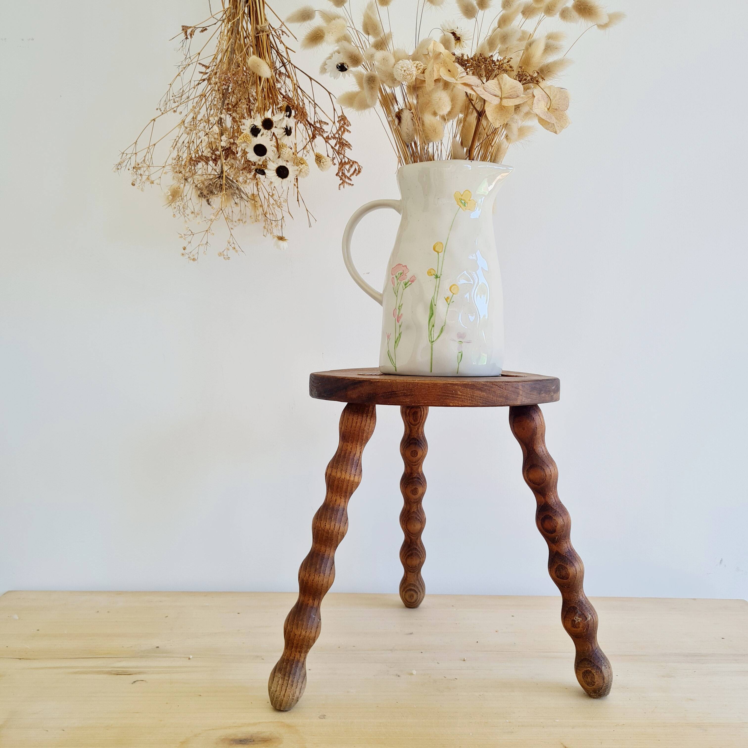 Antique wooden tripod stool