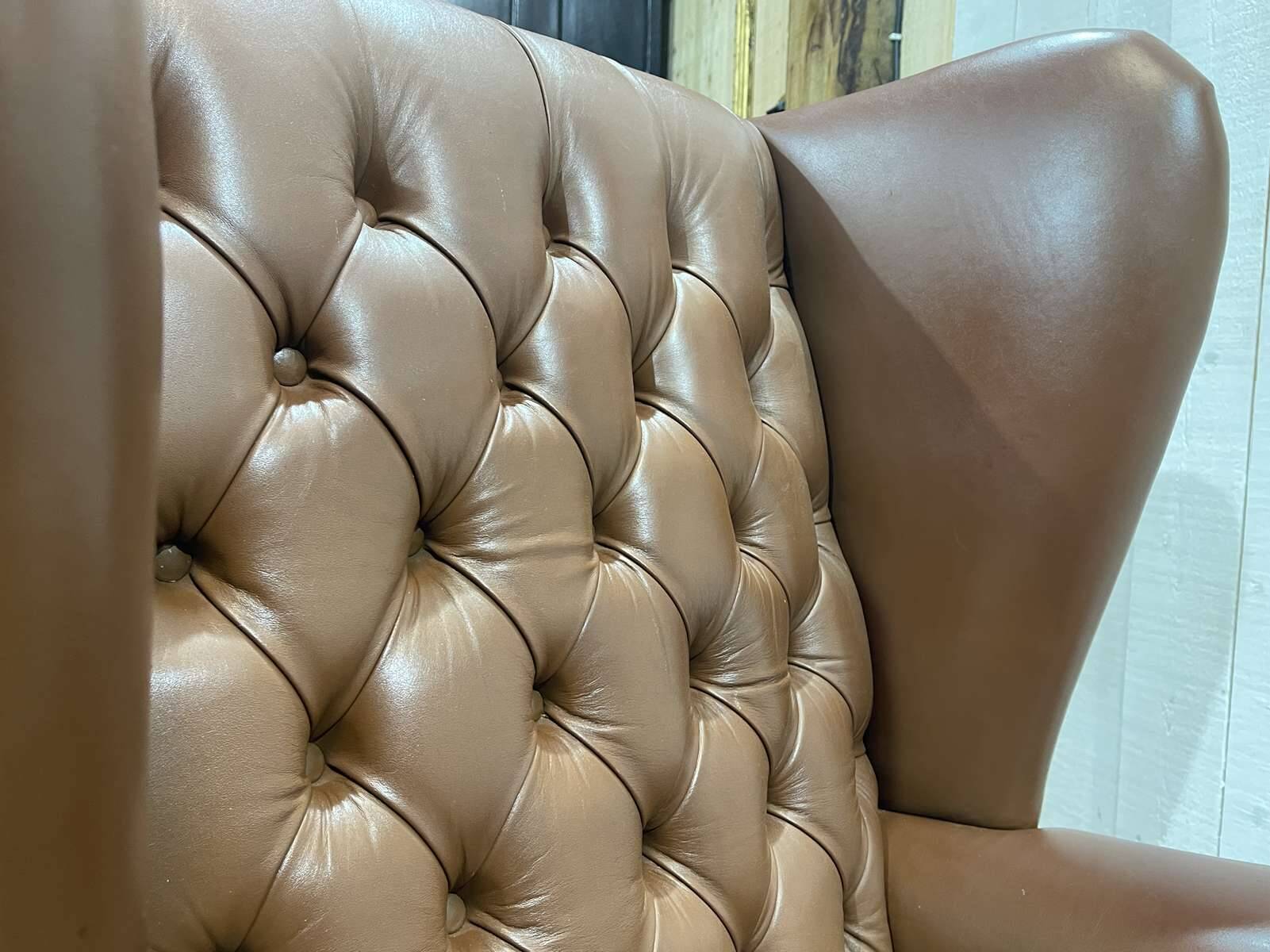 Pair of 1970s Chesterfield wingback chairs in brown leather