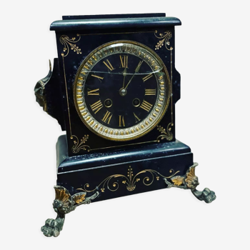 Black marble clock and brass ornament